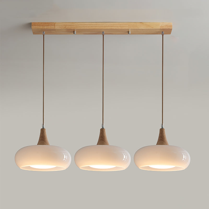 LumaWood Amber Glass Wood Pendant Light With Sleek Metal Detail