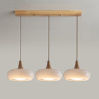 LumaWood Amber Glass Wood Pendant Light With Sleek Metal Detail