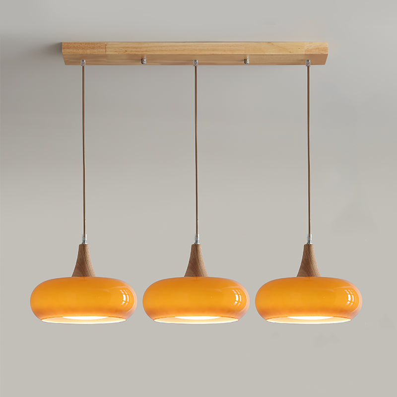LumaWood Amber Glass Wood Pendant Light With Sleek Metal Detail